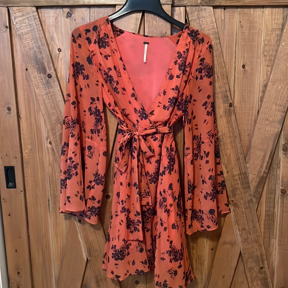 Free people coral mini dress with large bell sleeves and sash belt size small